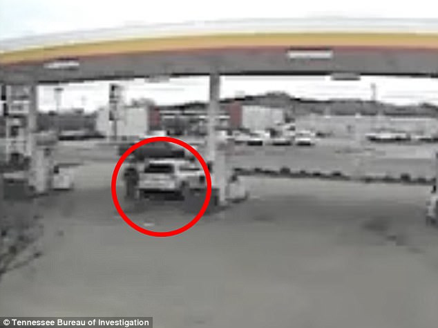 Surveillance footage shows teacher Tad Cummins filling up his silver Nissan Rogue at a gas station near a Shoney