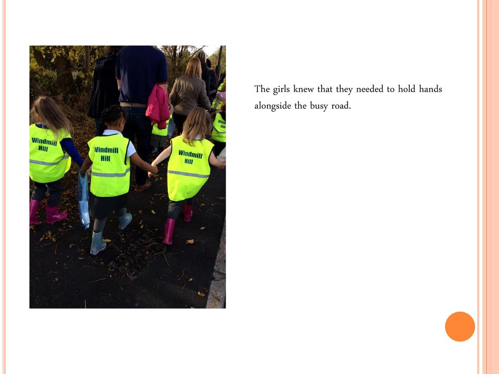 The girls knew that they needed to hold hands alongside the busy road.